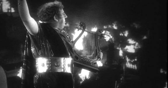 Nero plays lyre as Rome burns