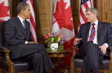 President Obama discusses with Prime Minister Stephen Harper, source Wikipedia.org
