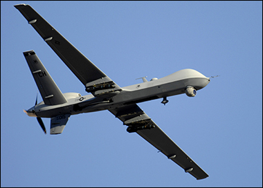 A MQ-9 Reaper drone spies on the population below.  (Photo: Public domain)