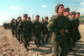 Russian troops marching through Chechnya Credit: kremlin.ru